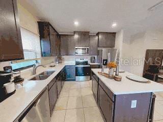 kitchen with a center island, sink, dark brown cabinets, light tile patterned flooring, and stainless steel appliances