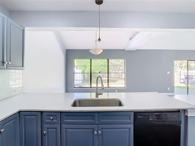 kitchen featuring dishwasher, decorative light fixtures, tasteful backsplash, blue cabinets, and sink