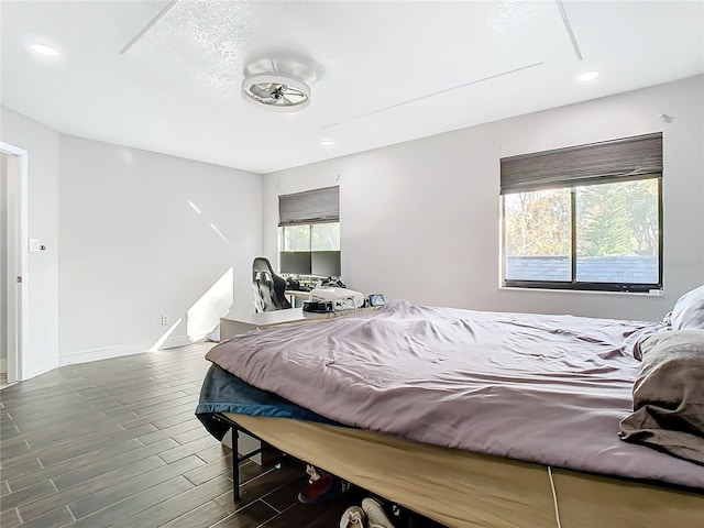 bedroom featuring multiple windows