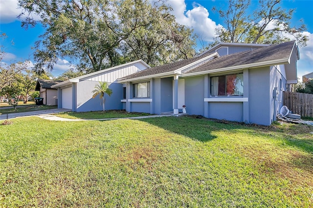 ranch-style home with a front yard