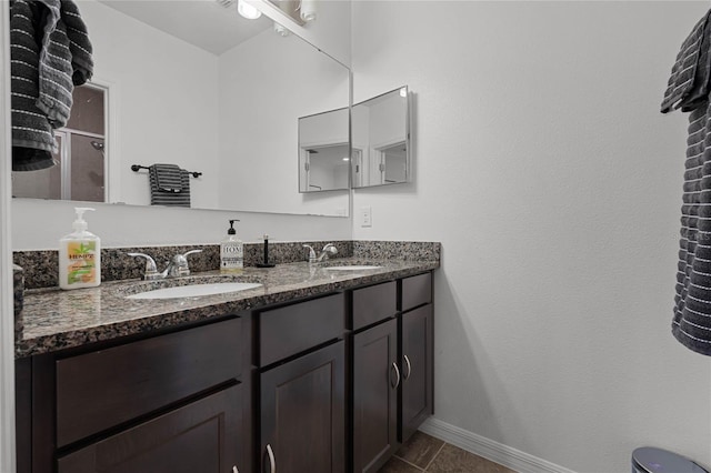 bathroom with vanity and tile patterned floors