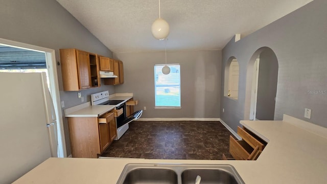 kitchen featuring pendant lighting, white appliances, a textured ceiling, and lofted ceiling