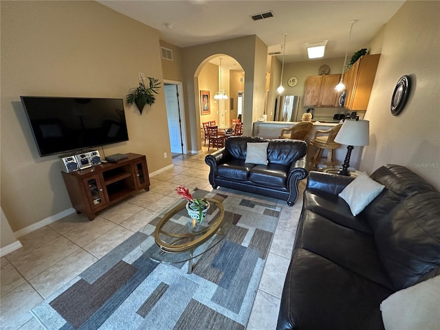 living room with light tile patterned floors