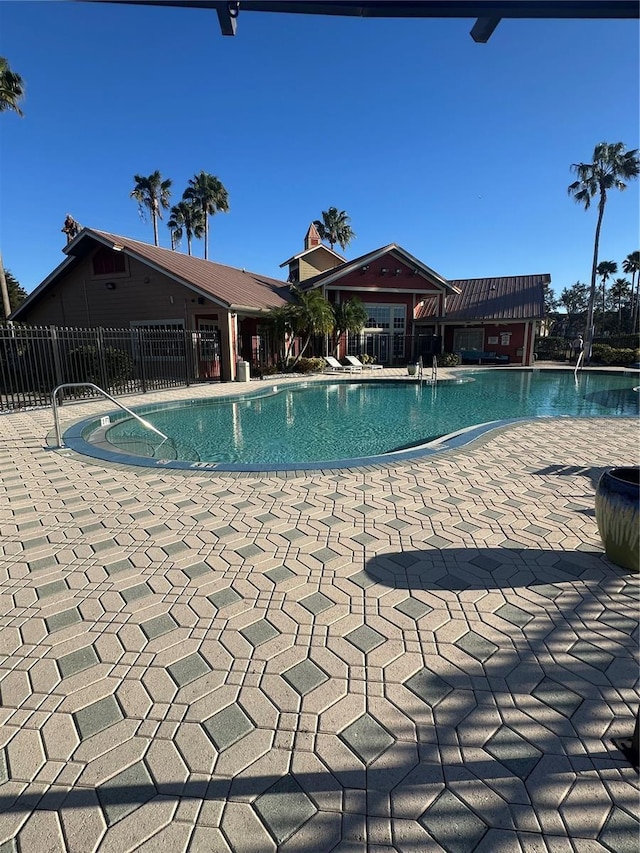 view of pool featuring a patio