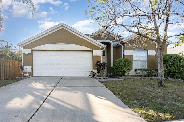 ranch-style home with a garage