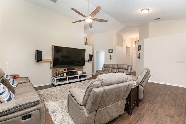 living room with ceiling fan, high vaulted ceiling, dark wood-type flooring, and a textured ceiling