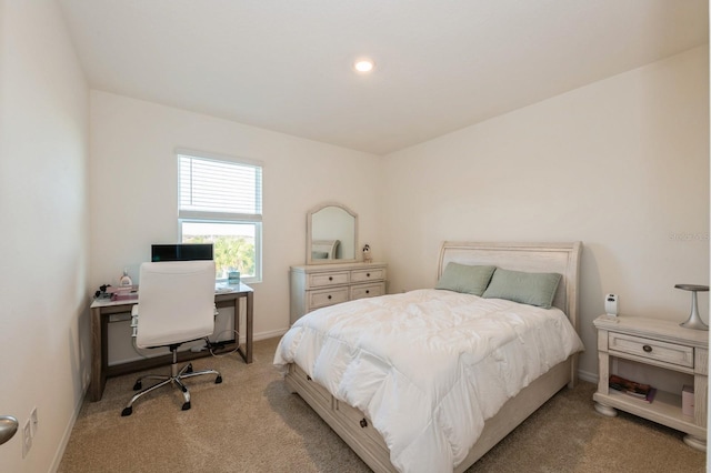 bedroom with light carpet