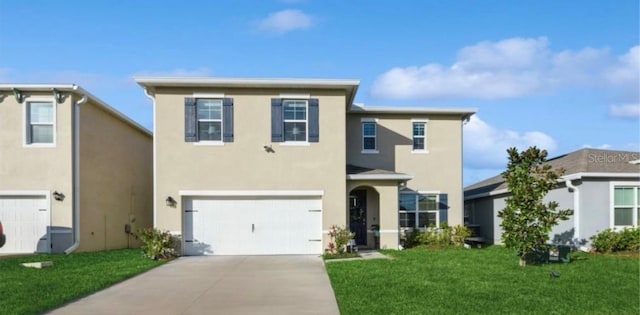 front of property with a garage and a front lawn