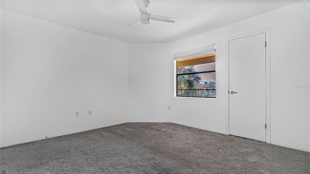 carpeted empty room with ceiling fan