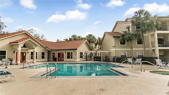 view of swimming pool featuring a patio