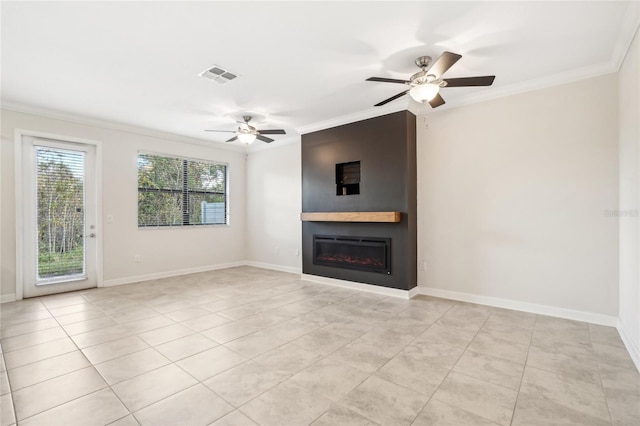 unfurnished living room with a large fireplace, ceiling fan, ornamental molding, and light tile patterned flooring