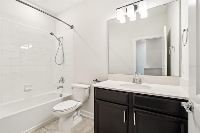 full bathroom featuring tile patterned flooring, vanity, toilet, and tiled shower / bath