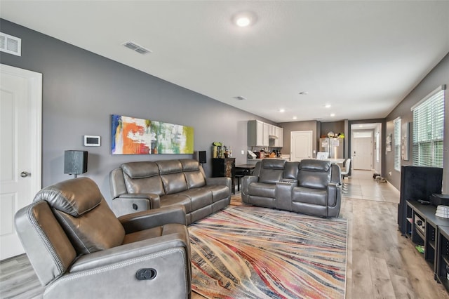 living room with light wood-type flooring