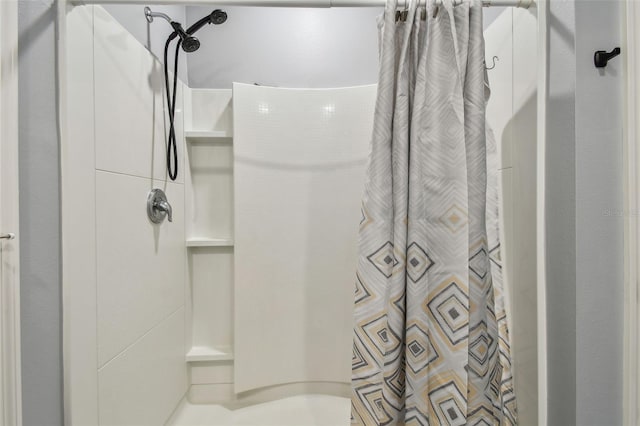 bathroom featuring walk in shower