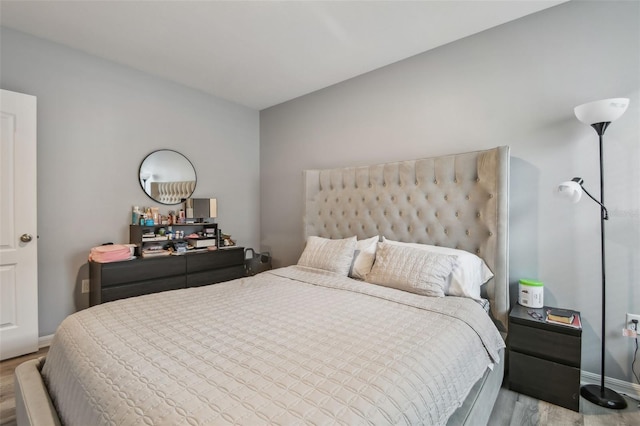 bedroom with light wood-type flooring