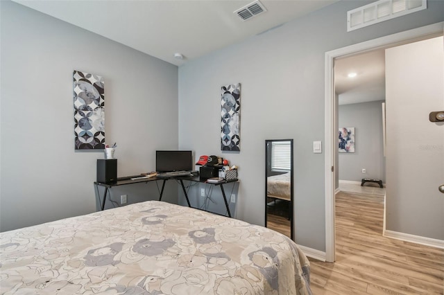 bedroom featuring light hardwood / wood-style flooring