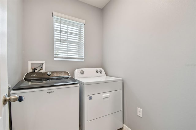 laundry room featuring independent washer and dryer