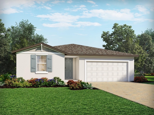 view of front of house featuring a front yard and a garage