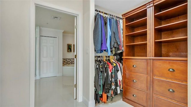 walk in closet featuring visible vents