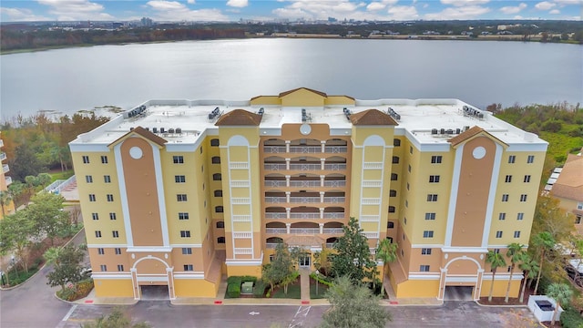 view of building exterior featuring a water view