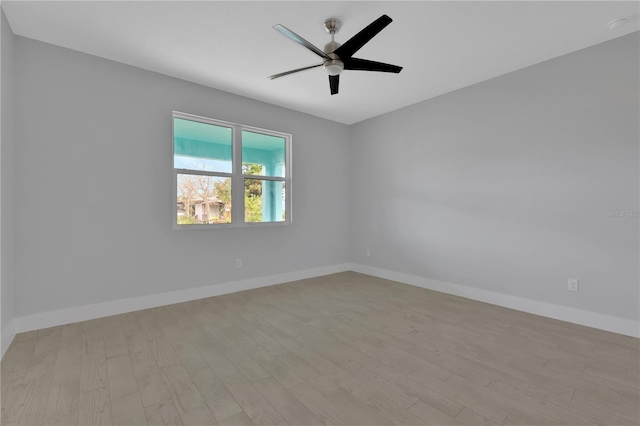 unfurnished room featuring ceiling fan and light hardwood / wood-style flooring