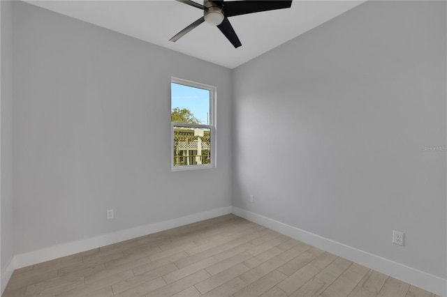 unfurnished room featuring light hardwood / wood-style floors and ceiling fan