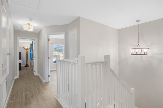 hallway with light wood-type flooring