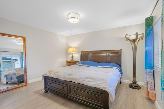 bedroom featuring light wood-type flooring