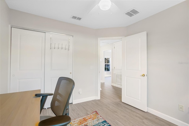 office featuring ceiling fan and light hardwood / wood-style floors