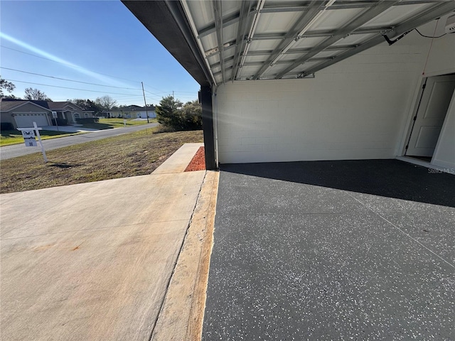 garage with a carport