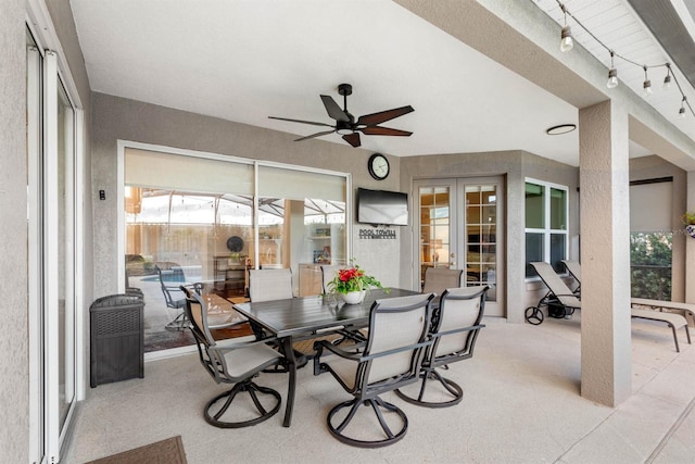 exterior space with french doors and ceiling fan