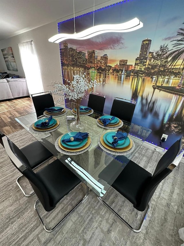 dining area featuring hardwood / wood-style floors