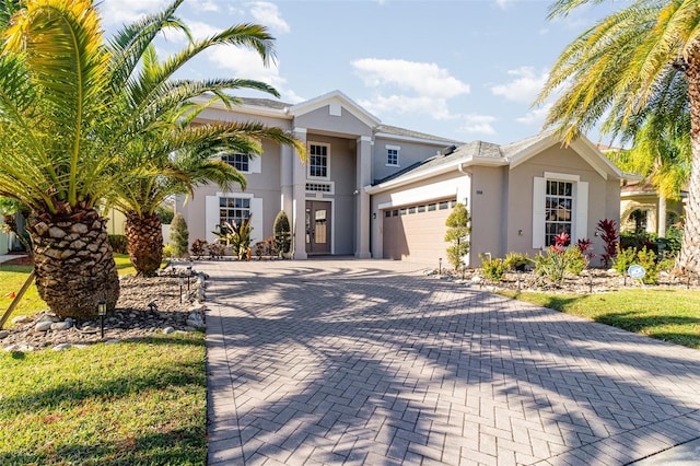 view of front of property with a garage