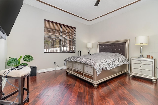 bedroom featuring hardwood / wood-style floors and ceiling fan