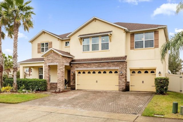 view of front of property with a garage