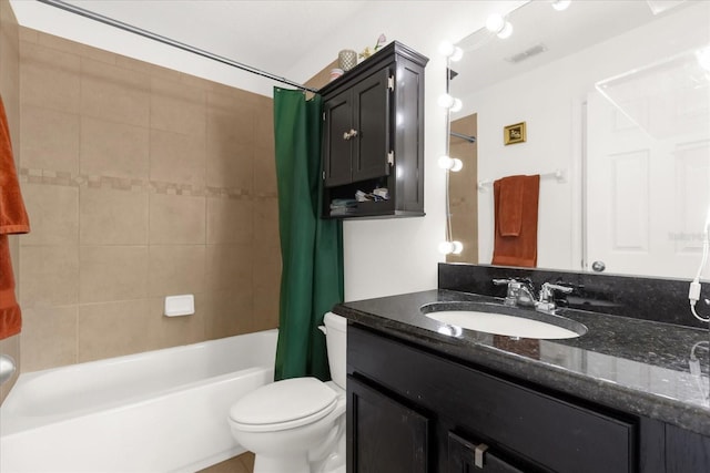 full bathroom with shower / bath combination with curtain, vanity, and toilet