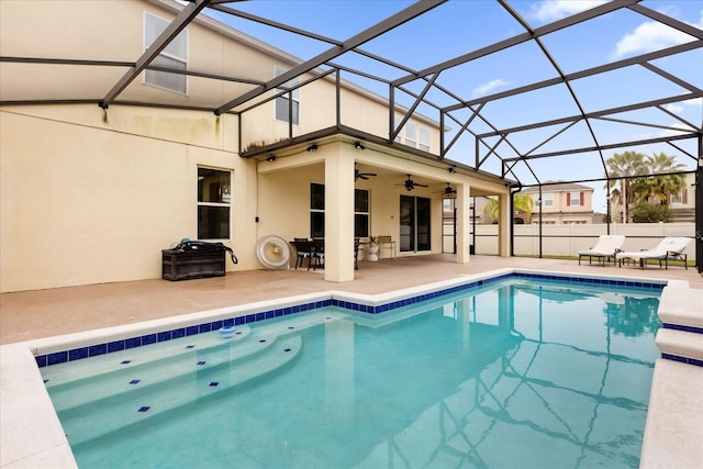 view of pool with a lanai and a patio area