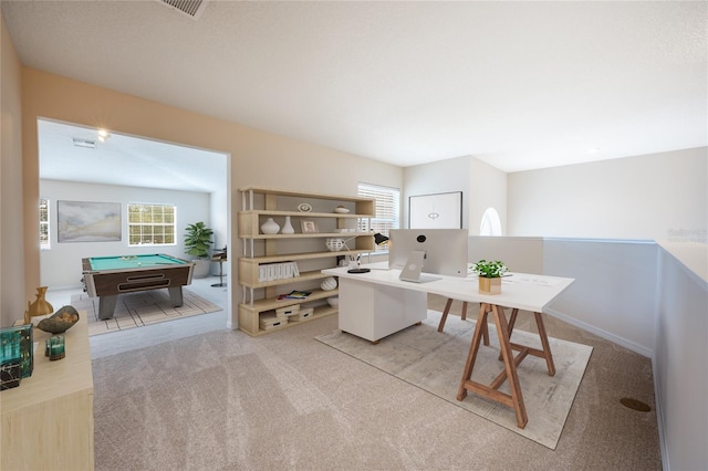 carpeted home office with a healthy amount of sunlight and pool table