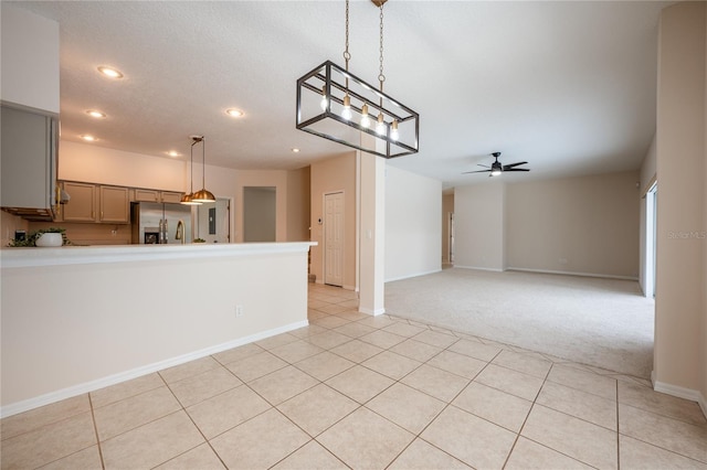 kitchen with gray cabinetry, ceiling fan, light tile patterned floors, decorative light fixtures, and stainless steel fridge with ice dispenser