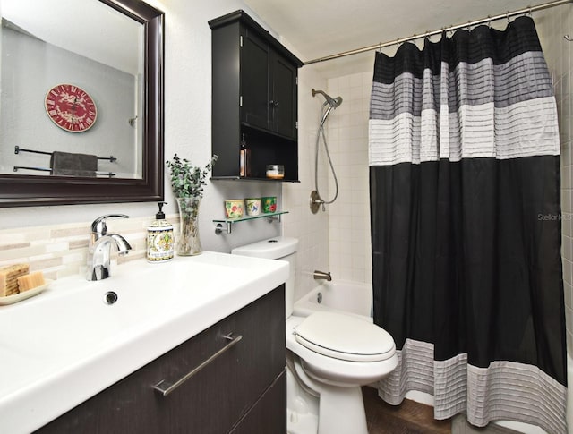 full bathroom featuring decorative backsplash, shower / bath combo with shower curtain, vanity, and toilet