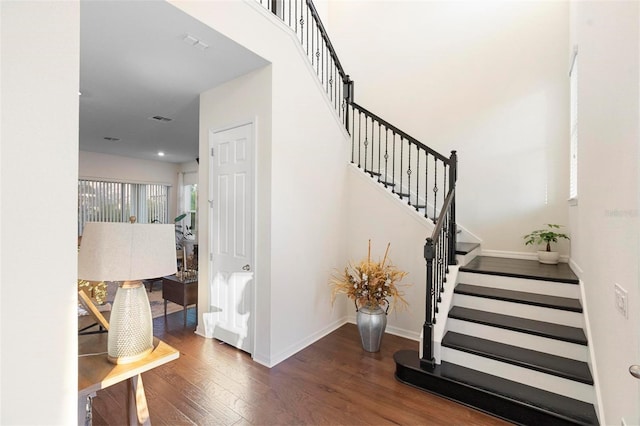 stairs with wood-type flooring