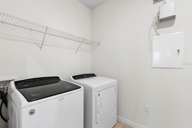 laundry room featuring washing machine and dryer