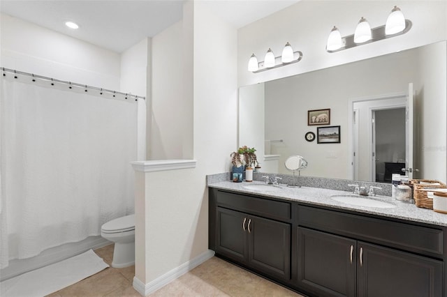 full bathroom with tile patterned flooring, vanity, shower / tub combo, and toilet