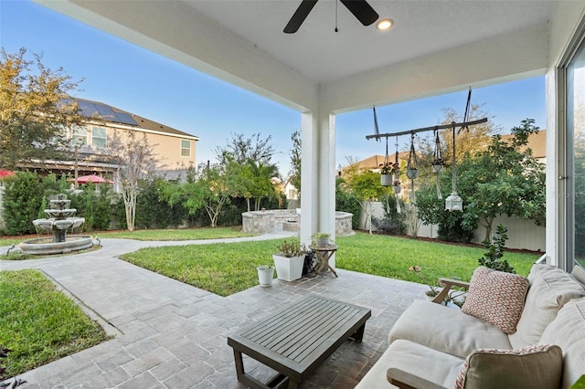 view of patio with ceiling fan