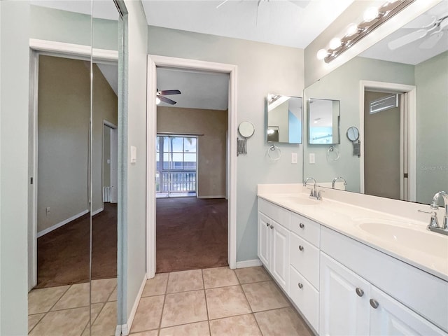 6629 Pineview Ter Unit 5-201, Bradenton, FL 34203 - full bathroom featuring a ceiling fan, double vanity, and tile patterned floors