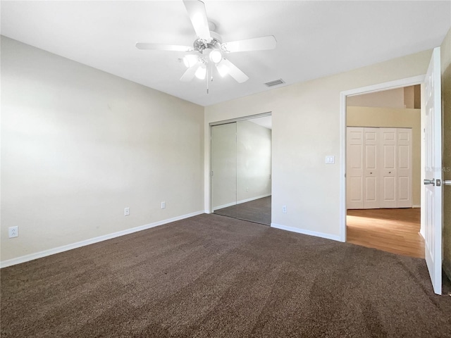 6629 Pineview Ter Unit 5-201, Bradenton, FL 34203 - unfurnished bedroom featuring carpet flooring, a closet, and ceiling fan