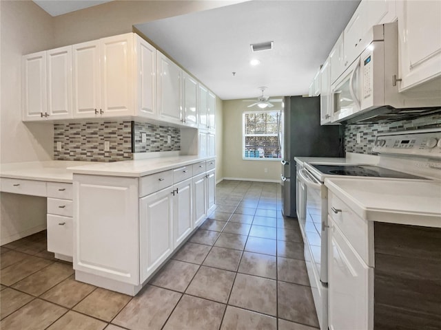 kitchen with backsplash, white cabinetry, ceiling fan, and white appliances