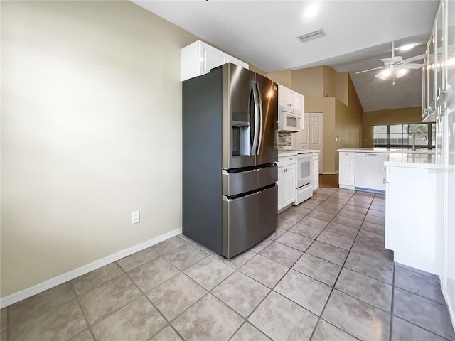 6629 Pineview Ter Unit 5-201, Bradenton, FL 34203 - kitchen featuring white appliances, lofted ceiling, white cabinetry, a ceiling fan, and light tile patterned floors