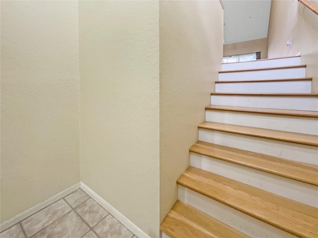 6629 Pineview Ter Unit 5-201, Bradenton, FL 34203 - stairway featuring tile patterned floors and baseboards