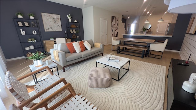 living room with light hardwood / wood-style floors